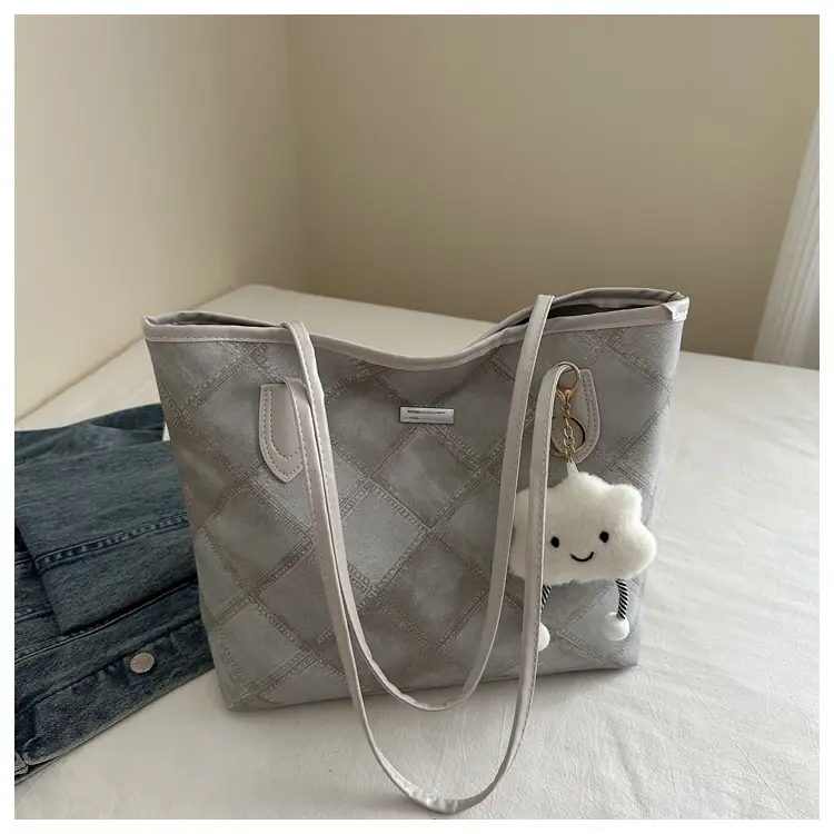 Women's Silver Quilted Shoulder Bag with Cute Pom Pom Design — feature 22