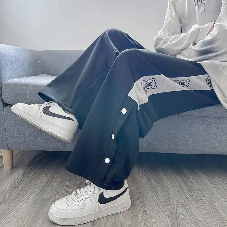 Women White Loose Button Sports Pants — feature 2
