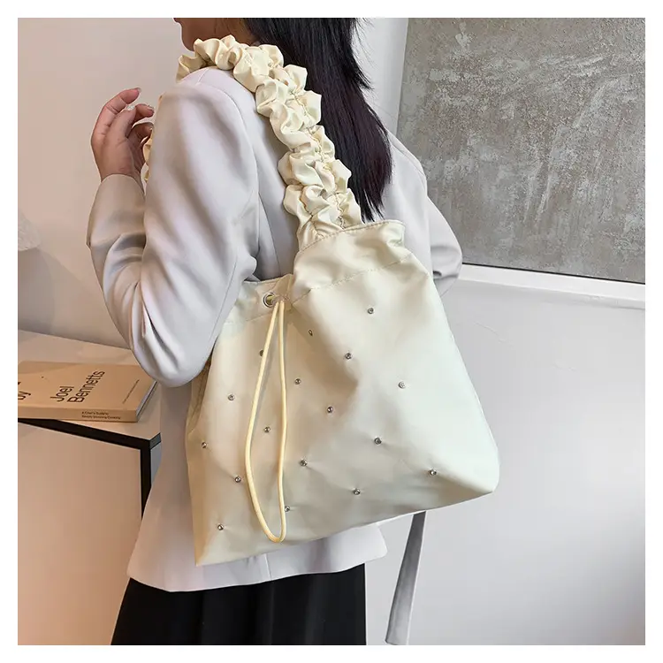 Nude Pleated Canvas Shoulder Bag with Ruffled Handles — feature 1