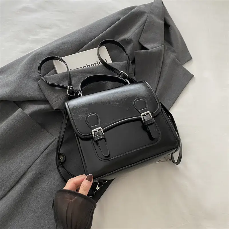 2024 Black Textured Shoulder Backpack with Double Buckle Closure - Image 2