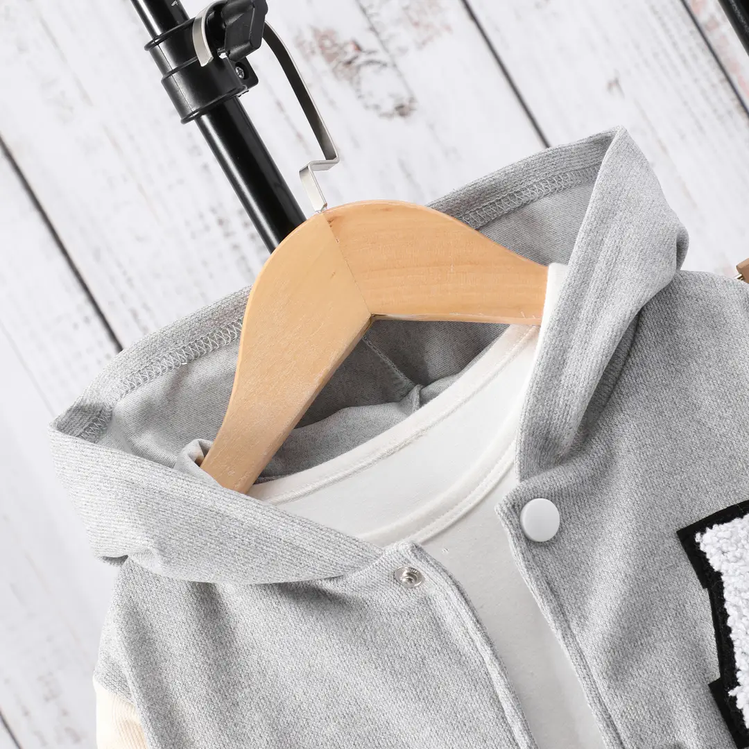 Long-sleeved hooded color A- shaped suit — feature 22