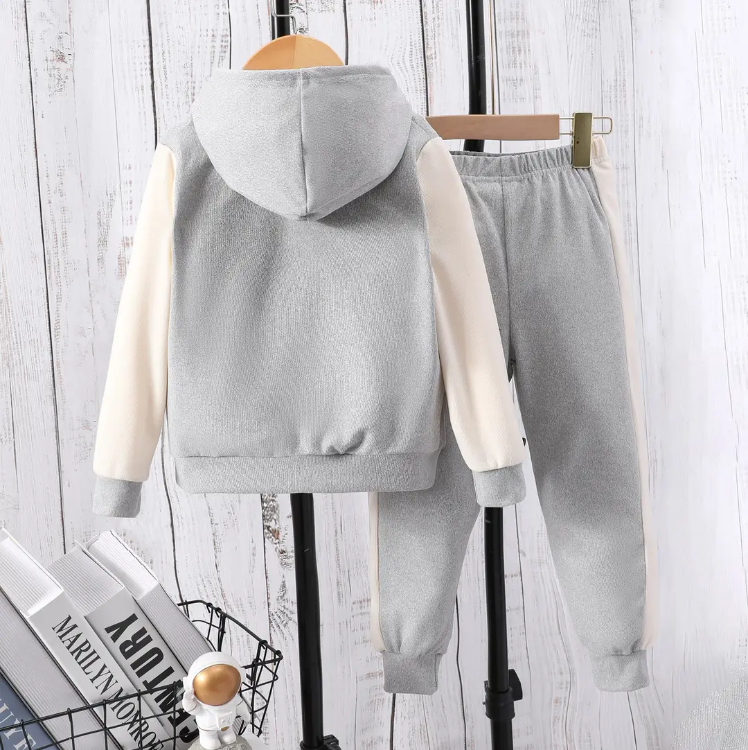 Long-sleeved hooded color A- shaped suit — feature 24