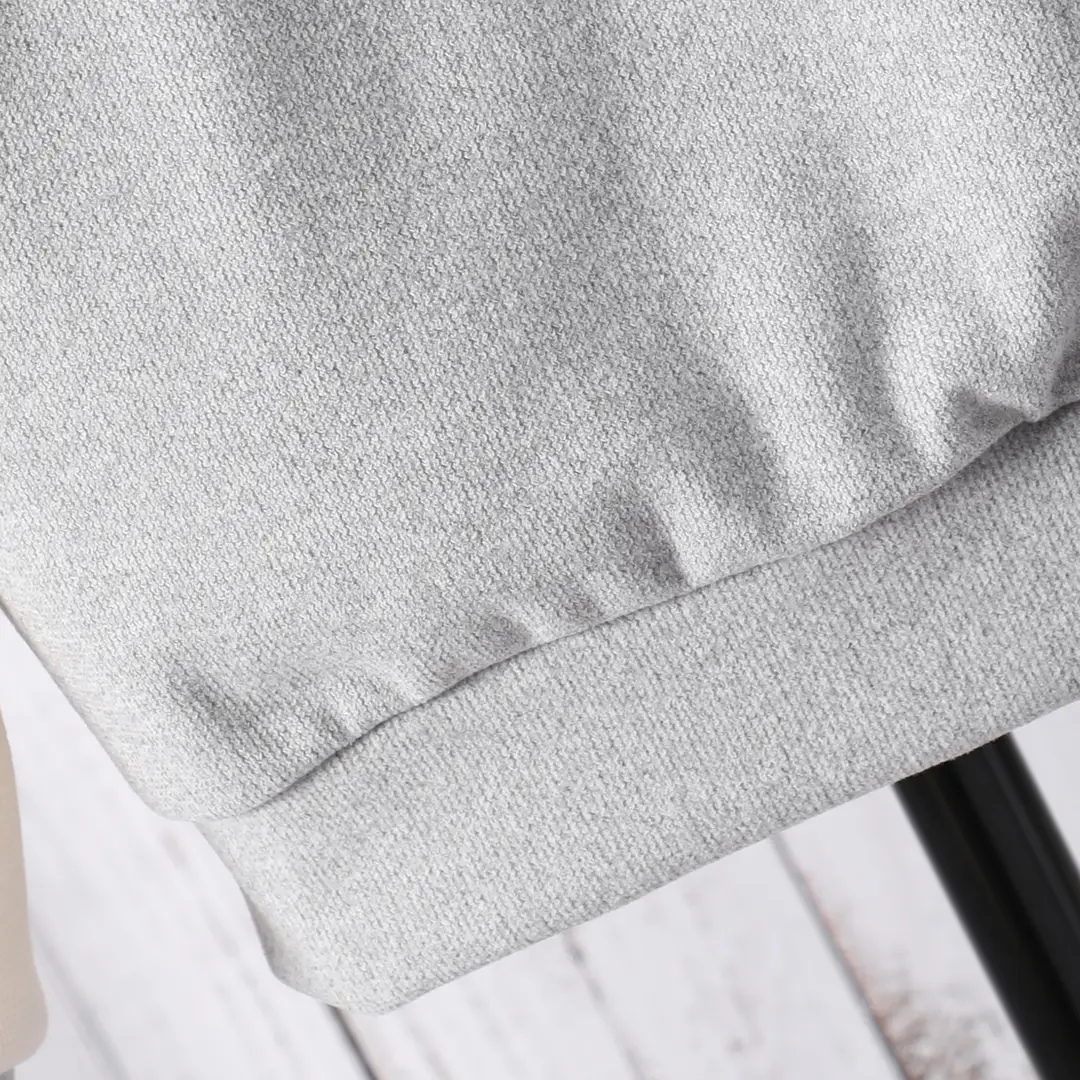 Long-sleeved hooded color A- shaped suit — feature 26