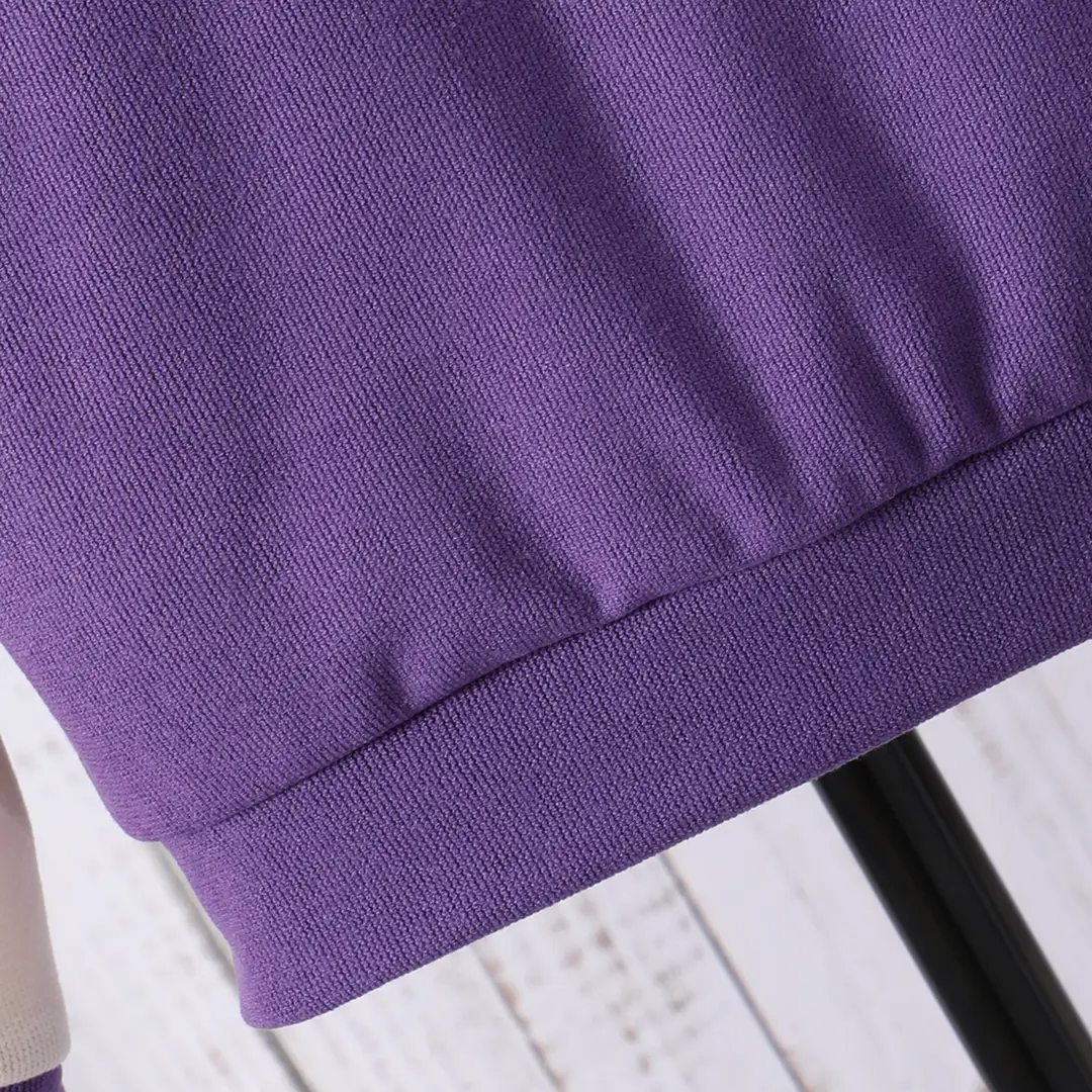 Long-sleeved hooded color A- shaped suit — feature 36