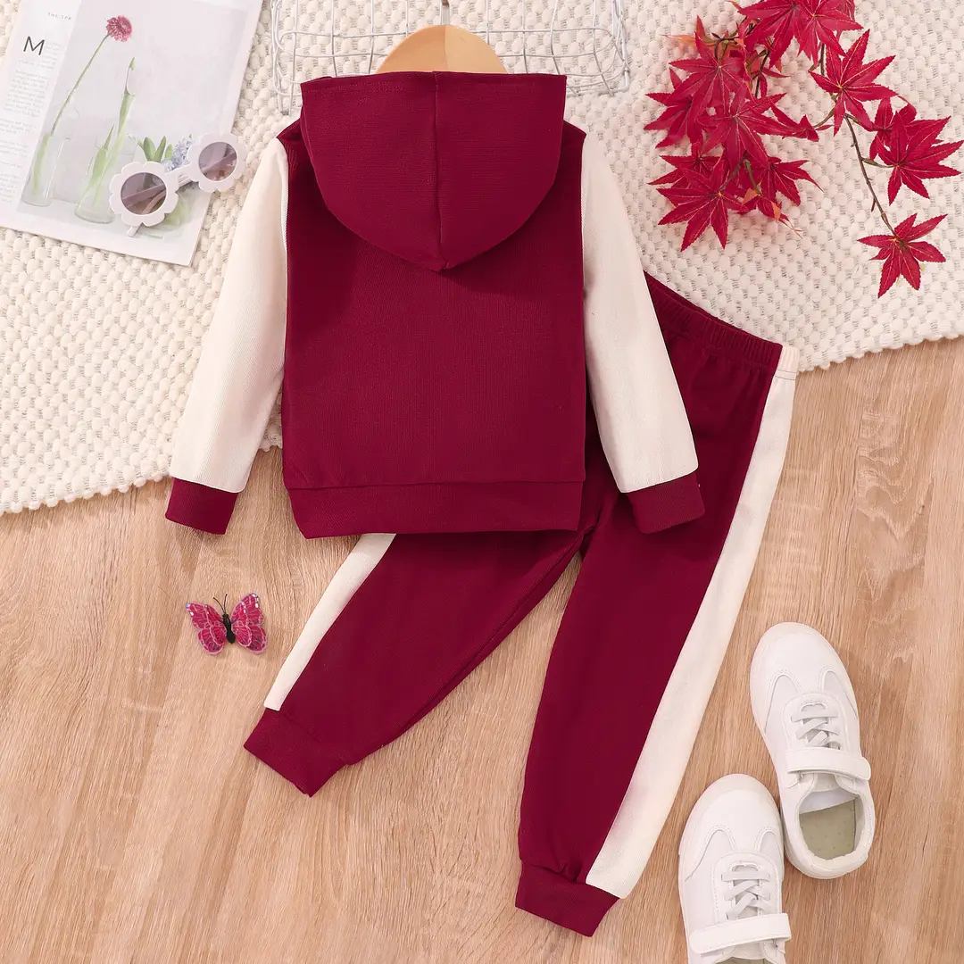 Long-sleeved hooded color A- shaped suit — feature 44