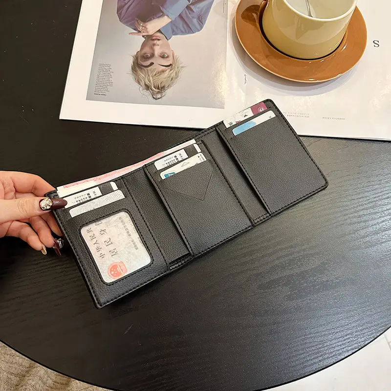 Cross-border high-end wallet women's new short multi-card three-fold buckle hand-held long wallet for hair