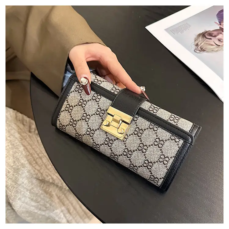 Cross-border high-end wallet women's new short multi-card three-fold buckle hand-held long wallet for hair — feature 13