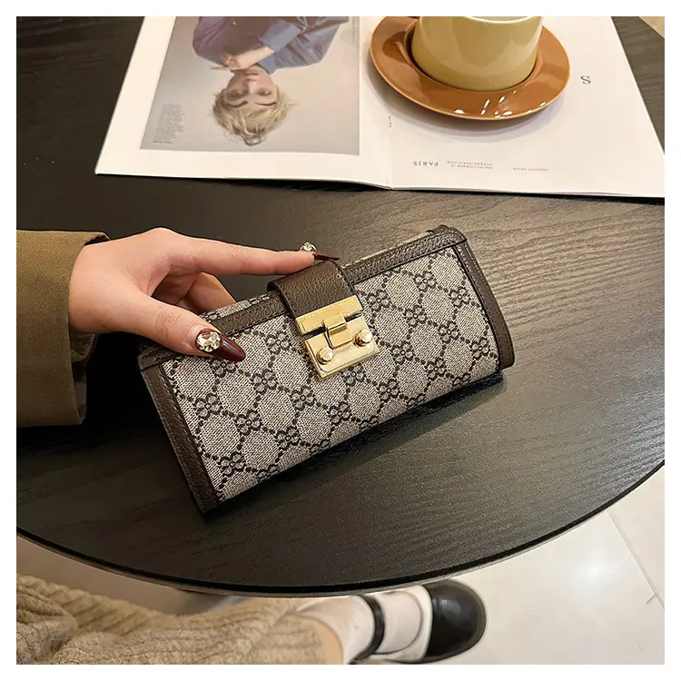 Cross-border high-end wallet women's new short multi-card three-fold buckle hand-held long wallet for hair — feature 14
