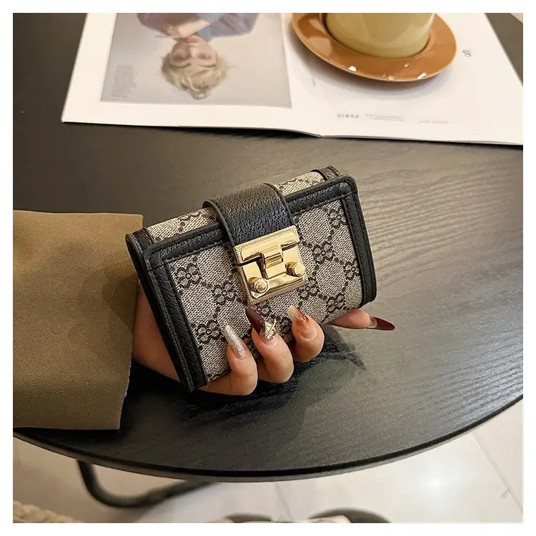 Cross-border high-end wallet women's new short multi-card three-fold buckle hand-held long wallet for hair — feature 19