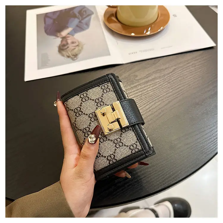 Cross-border high-end wallet women's new short multi-card three-fold buckle hand-held long wallet for hair — feature 20