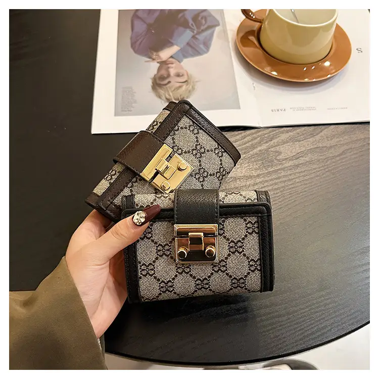 Cross-border high-end wallet women's new short multi-card three-fold buckle hand-held long wallet for hair — feature 21