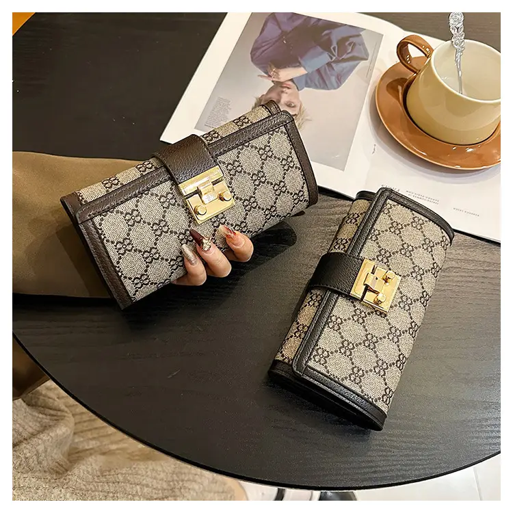 Cross-border high-end wallet women's new short multi-card three-fold buckle hand-held long wallet for hair — feature 22