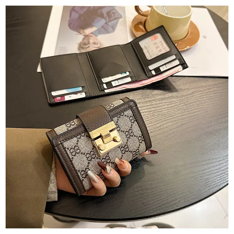 Cross-border high-end wallet women's new short multi-card three-fold buckle hand-held long wallet for hair — feature 23