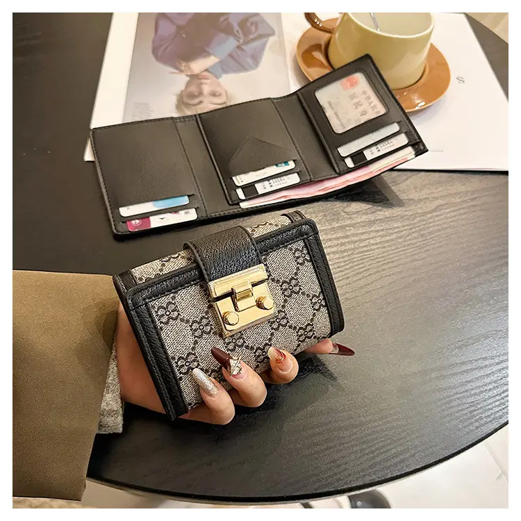 Cross-border high-end wallet women's new short multi-card three-fold buckle hand-held long wallet for hair — feature 24