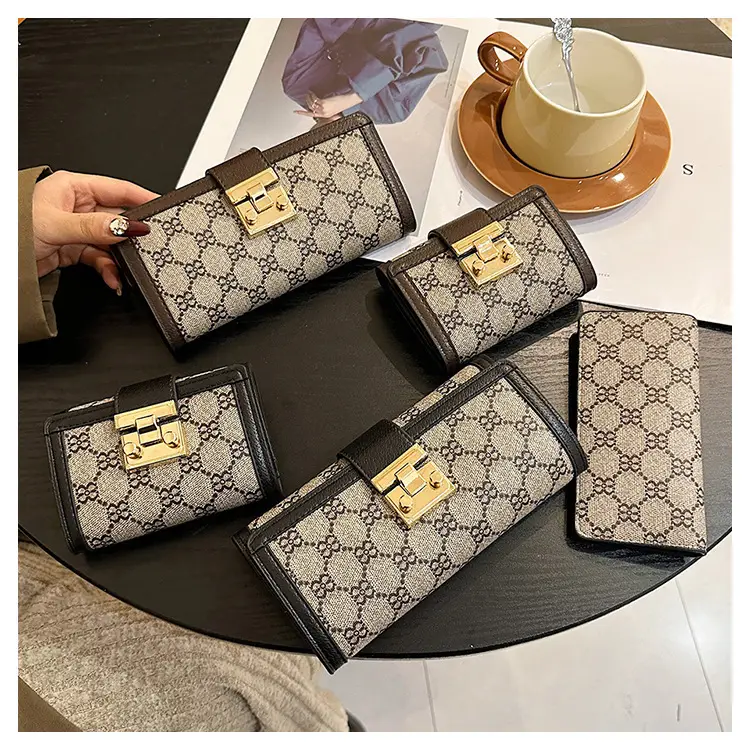 Cross-border high-end wallet women's new short multi-card three-fold buckle hand-held long wallet for hair — feature 30