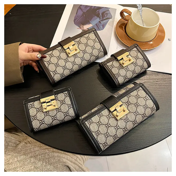 Cross-border high-end wallet women's new short multi-card three-fold buckle hand-held long wallet for hair — feature 31