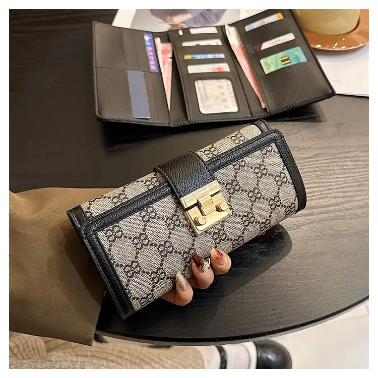 Cross-border high-end wallet women's new short multi-card three-fold buckle hand-held long wallet for hair — feature 32