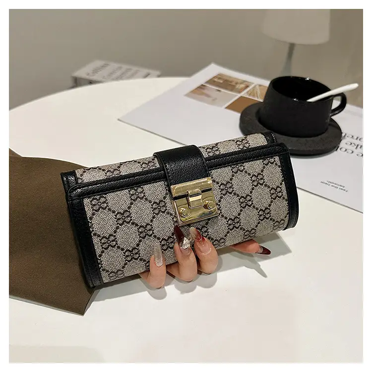 Cross-border high-end wallet women's new short multi-card three-fold buckle hand-held long wallet for hair — feature 33