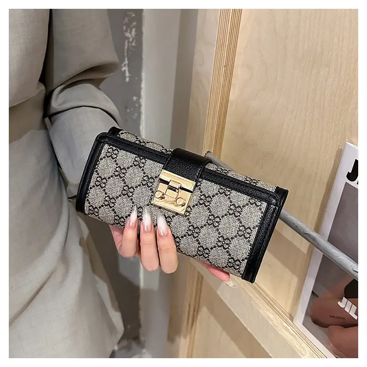 Cross-border high-end wallet women's new short multi-card three-fold buckle hand-held long wallet for hair — feature 36
