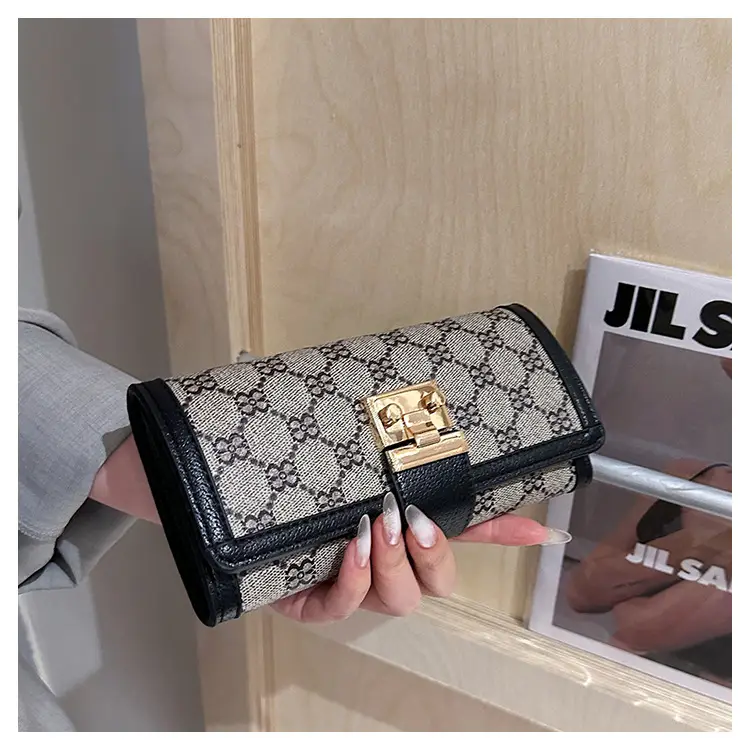 Cross-border high-end wallet women's new short multi-card three-fold buckle hand-held long wallet for hair — feature 37