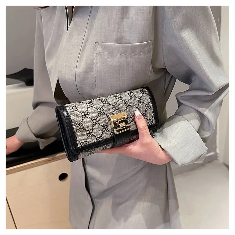 Cross-border high-end wallet women's new short multi-card three-fold buckle hand-held long wallet for hair — feature 41