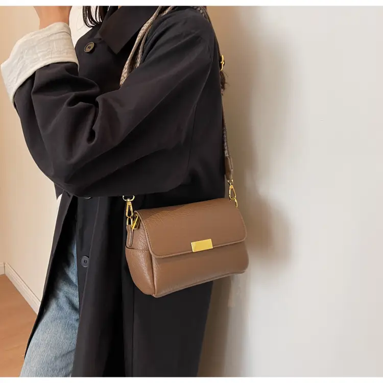 White Leather Crossbody Bag with Gold Clasp — feature 11