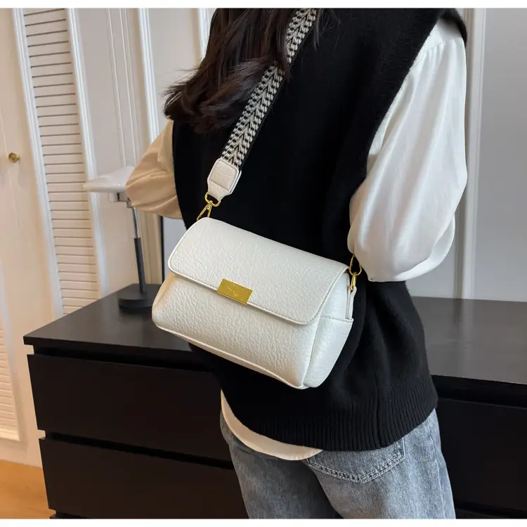 White Leather Crossbody Bag with Gold Clasp — feature 17