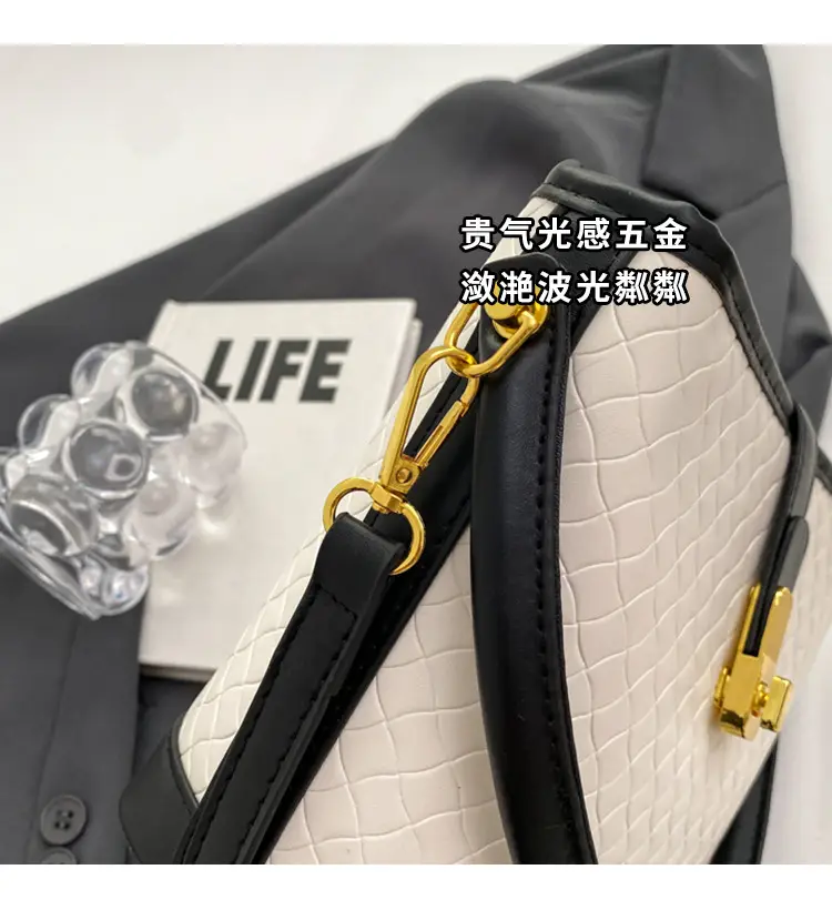 Black Quilted Crossbody Bag with Gold Clasp — feature 4