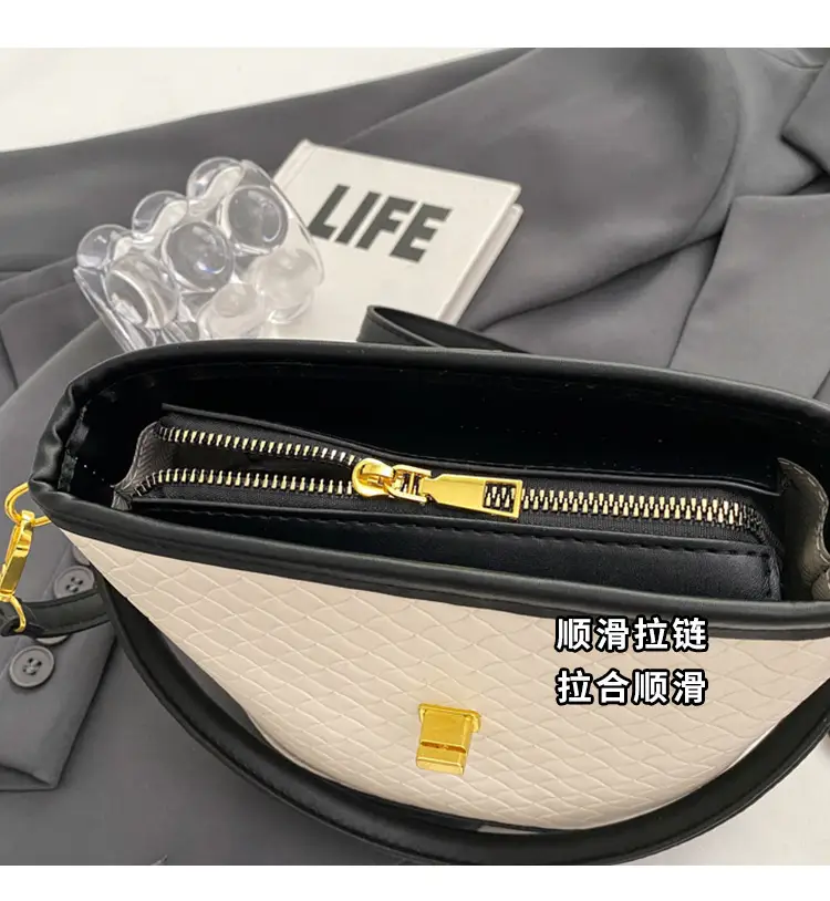 Black Quilted Crossbody Bag with Gold Clasp — feature 5