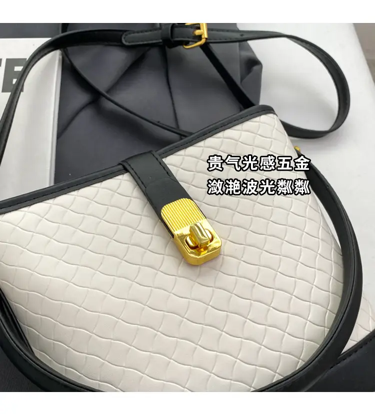 Black Quilted Crossbody Bag with Gold Clasp — feature 8