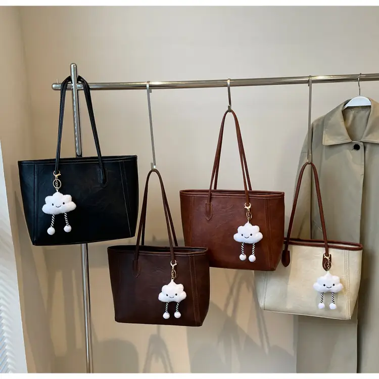Women's Retro Chic Shoulder Bag with Cloud Charm — feature 1