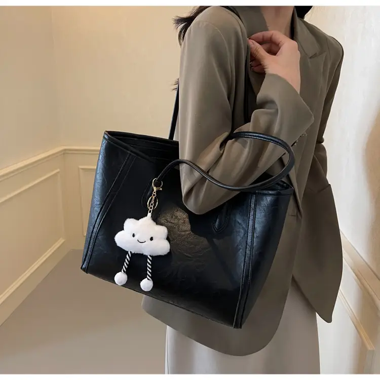 Women's Retro Chic Shoulder Bag with Cloud Charm — feature 9