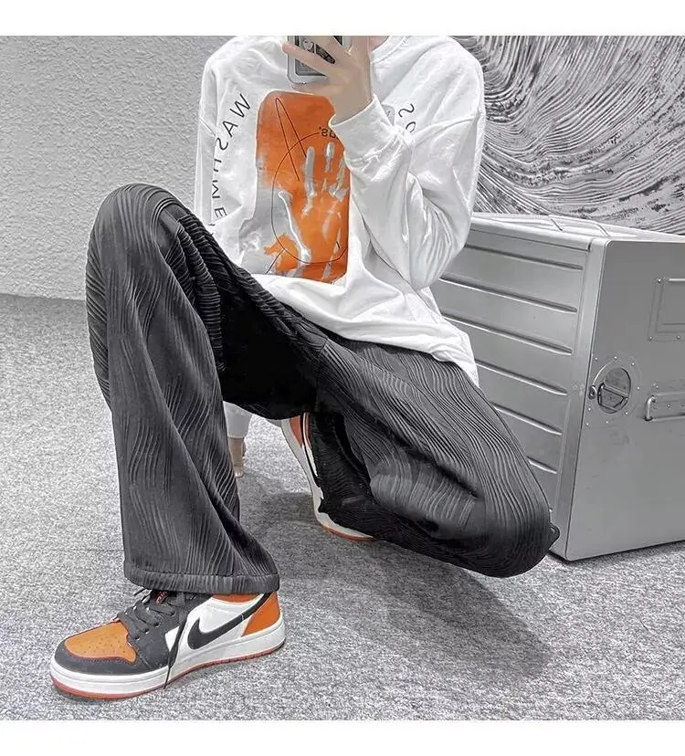 Men Knitted White Pants with Orange Sneakers — feature 13