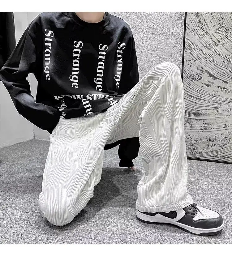 Men Knitted White Pants with Orange Sneakers — feature 17
