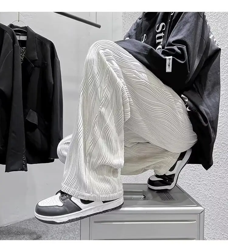 Men Knitted White Pants with Orange Sneakers — feature 19