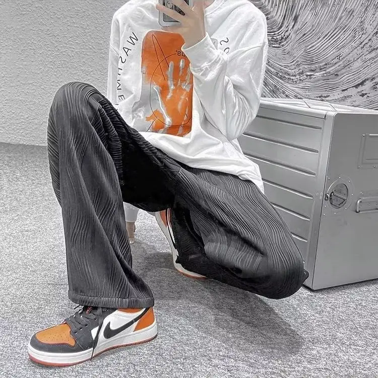 Men Knitted White Pants with Orange Sneakers — feature 21