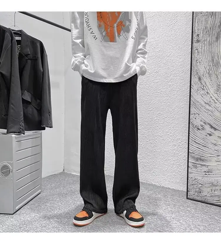 Men Knitted White Pants with Orange Sneakers — feature 4