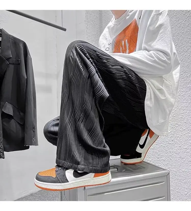 Men Knitted White Pants with Orange Sneakers — feature 9