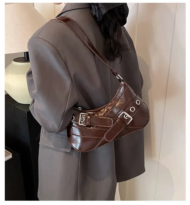 Brown Quilted Shoulder Bag with Buckle & Ring Detail — feature 1