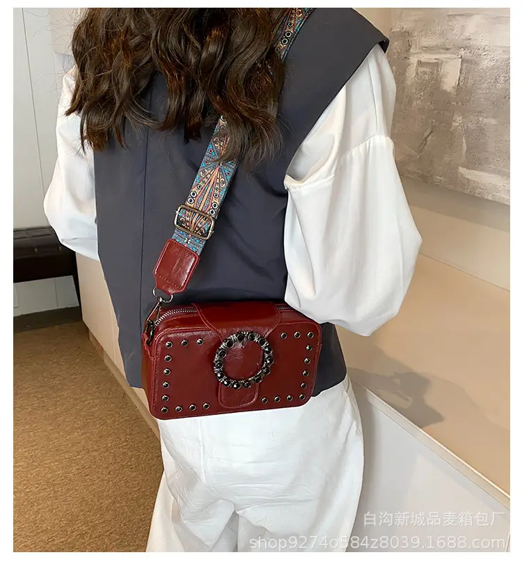 Women's Brown Leather Crossbody Bag with Studded Strap — feature 1