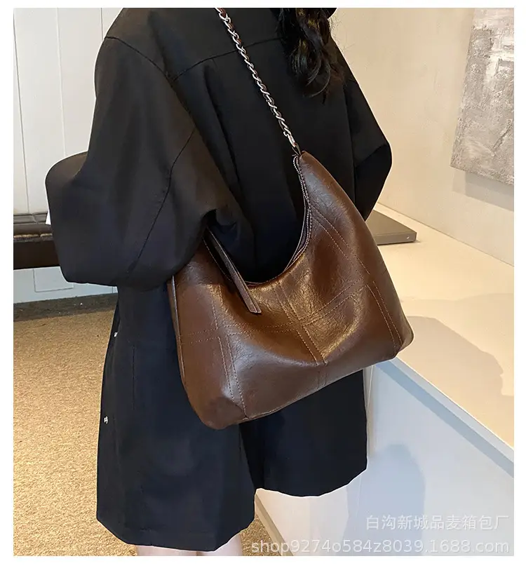 Brown Textured Lazy Shoulder Bag with Chain — feature 1