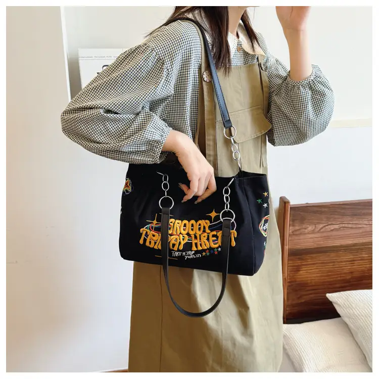 Black Graphic Canvas Shoulder Bag for Women 2024 — feature 16