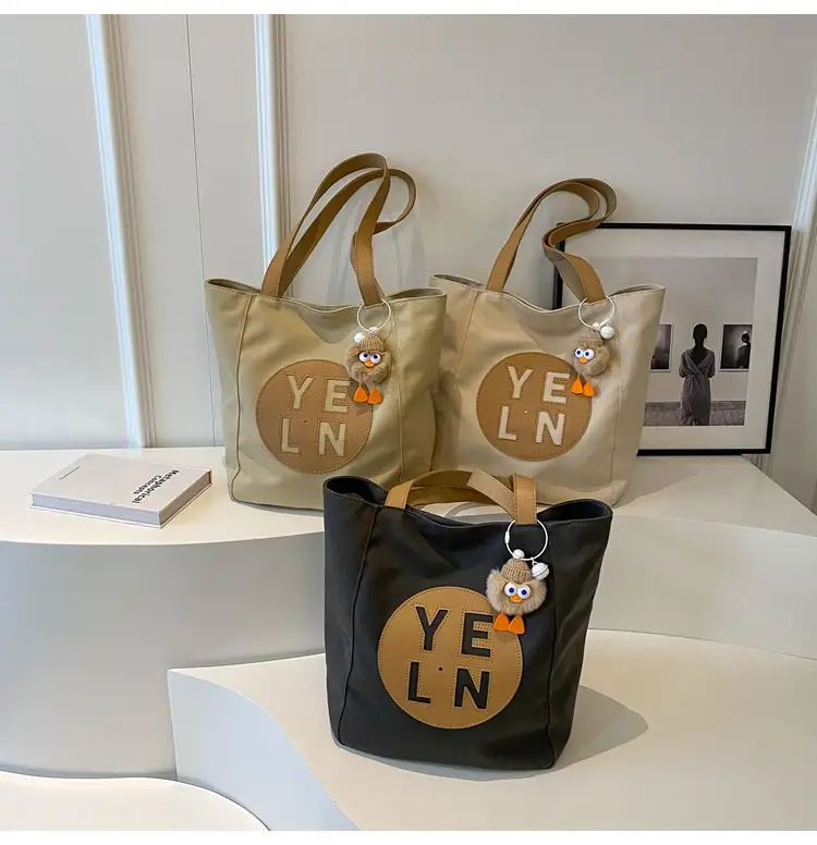 Women's Black Yellow Leather Tote Bag with Cute Charm — feature 1