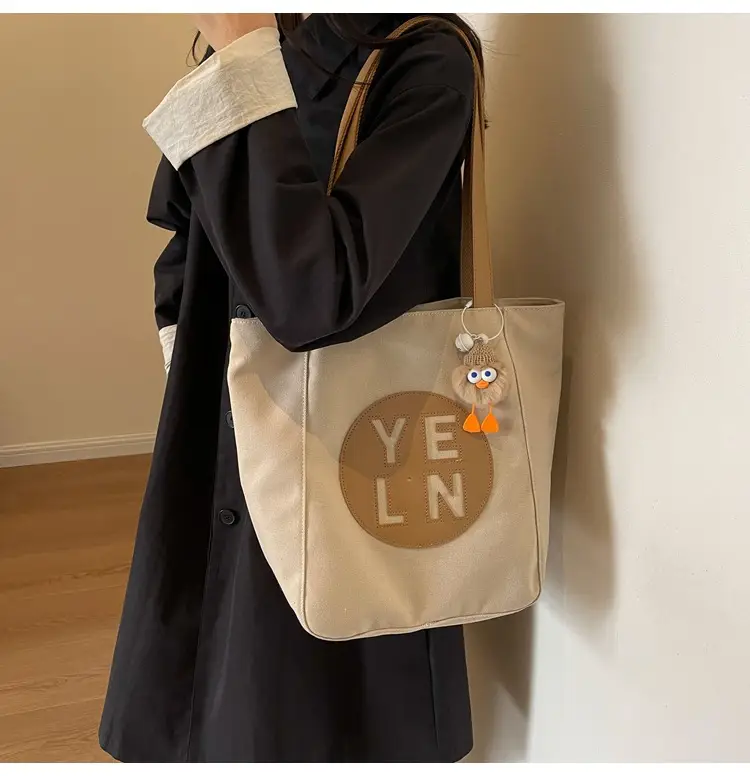 Women's Black Yellow Leather Tote Bag with Cute Charm — feature 10