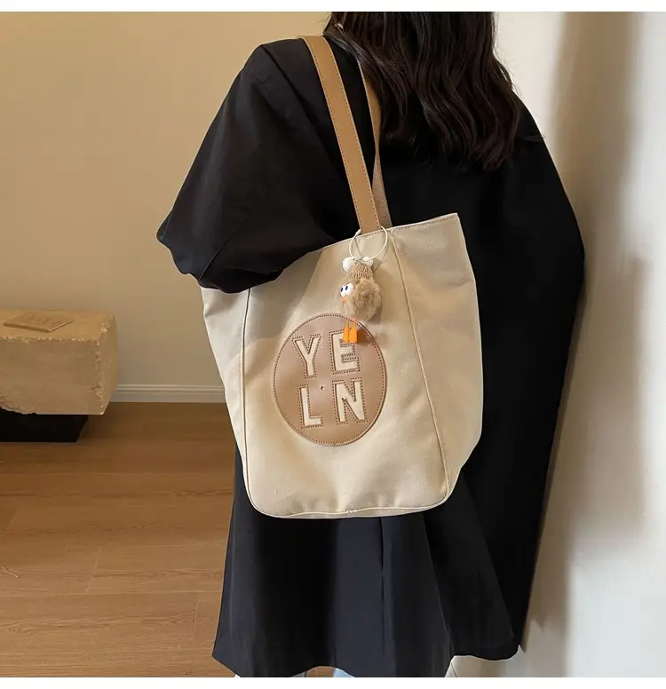 Women's Black Yellow Leather Tote Bag with Cute Charm — feature 11