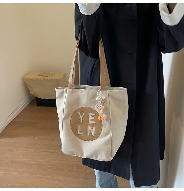 Women's Black Yellow Leather Tote Bag with Cute Charm — feature 13
