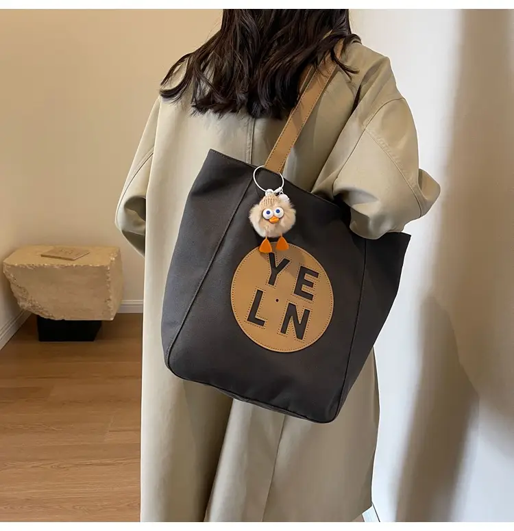 Women's Black Yellow Leather Tote Bag with Cute Charm — feature 17