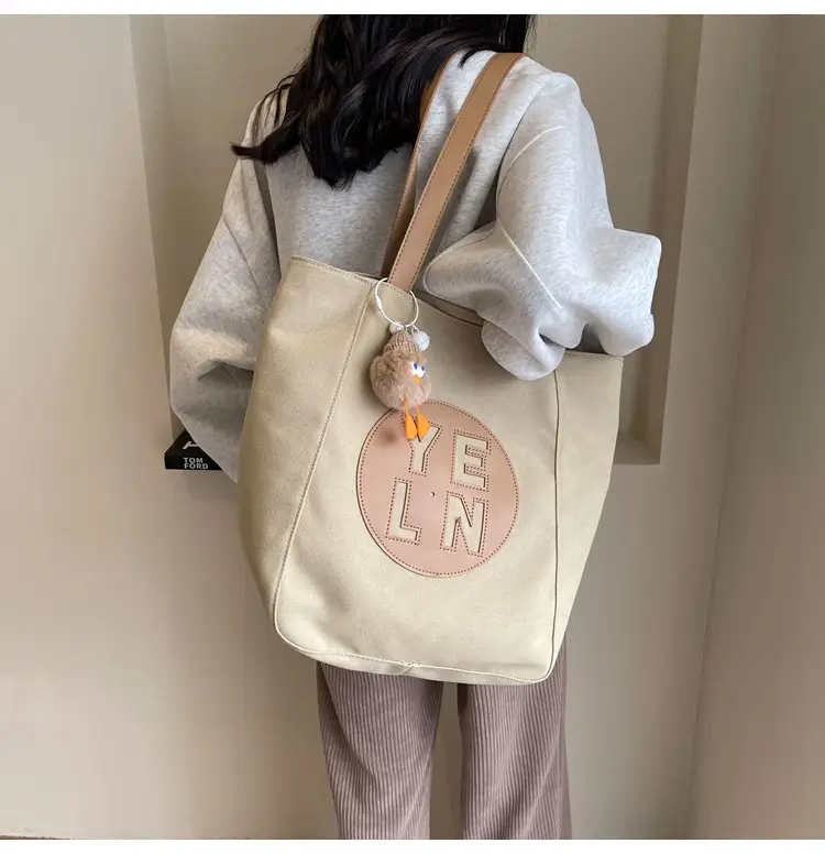Women's Black Yellow Leather Tote Bag with Cute Charm — feature 22