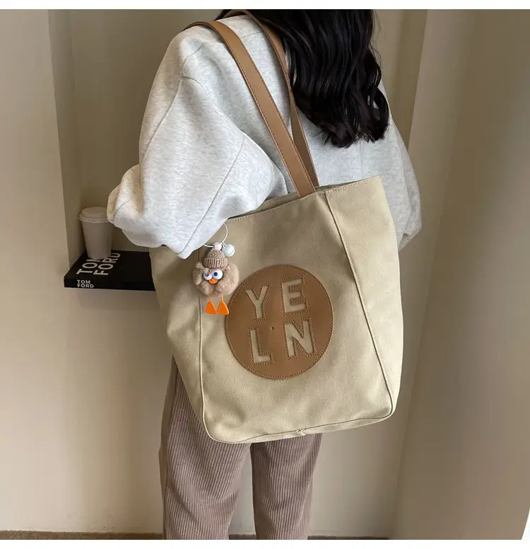 Women's Black Yellow Leather Tote Bag with Cute Charm — feature 24