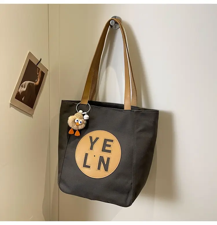 Women's Black Yellow Leather Tote Bag with Cute Charm — feature 28